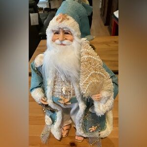 Festive Santa Claus Holiday Decor in Blue and White